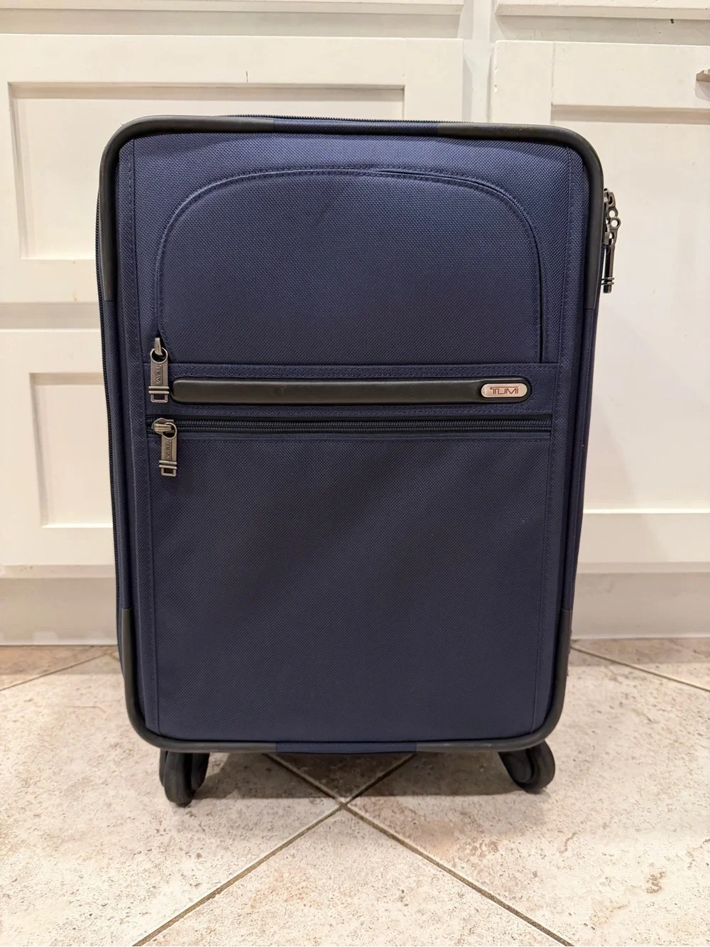 Tumi Navy Softside Carry-On Spinner